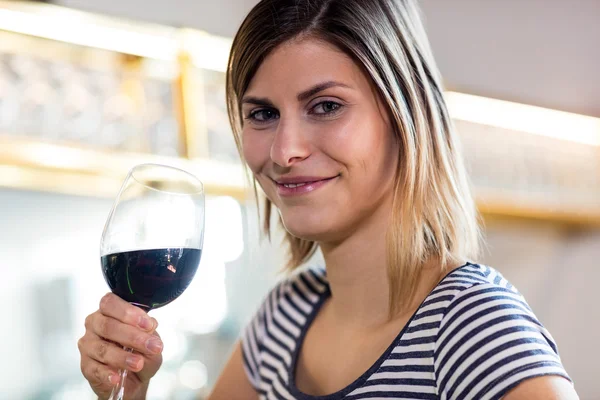 Beautiful young woman drinking wine — Stock Photo, Image