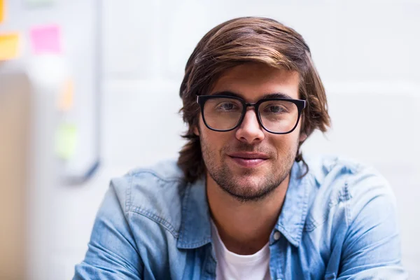 Young man in creative office — Stock Photo, Image