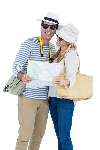 Couple holding map — Stock Photo, Image