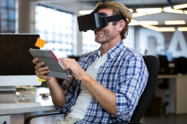 businessman using virtual reality simulator  clipart
