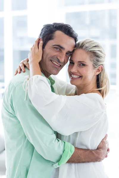 Romantic couple embracing at home — Stock Photo, Image