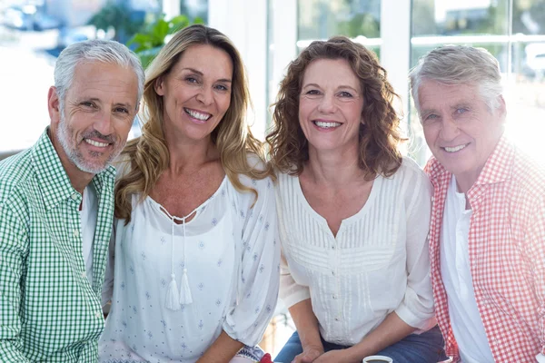 Happy mature couples in restaurant — Stock Photo, Image