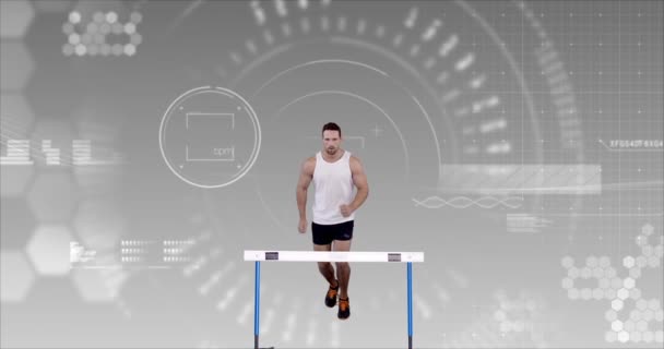Athlete jumping over hurdle — Stock Video