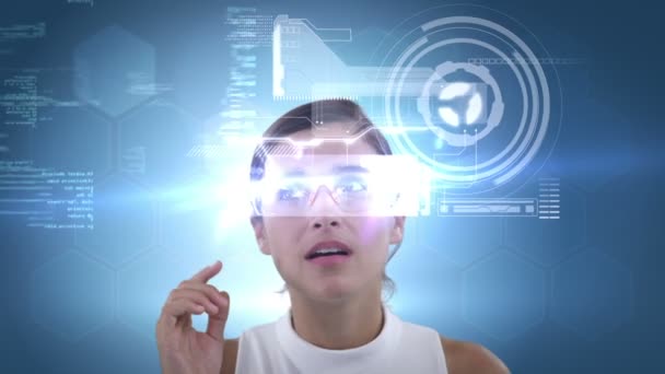 Smiling woman is using futuristic glasses — Stock Video