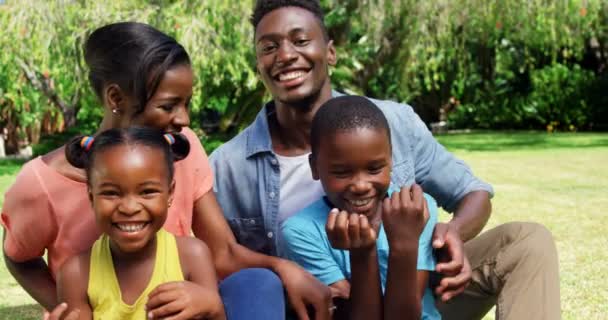 Parents tickling their children — Stock Video