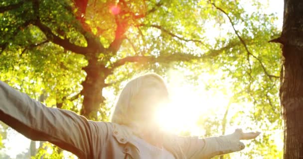 Happy woman in park — Stock Video