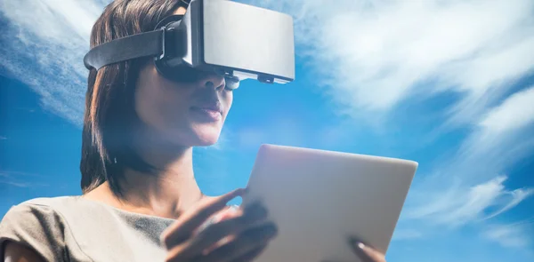 Businesswoman holding virtual glasses — Stock Photo, Image