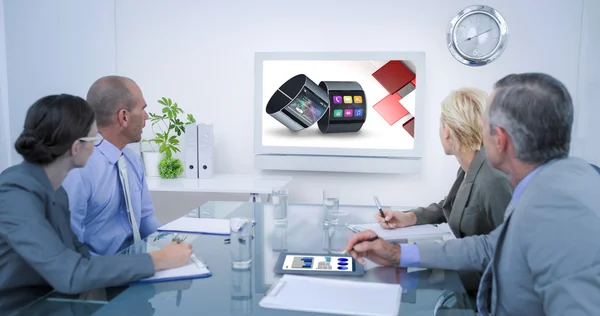 Business team looking at time clock — Stock Photo, Image