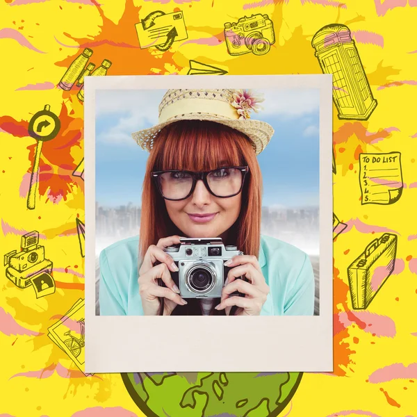 Portrait of a smiling hipster woman holding retro — Stock Photo, Image