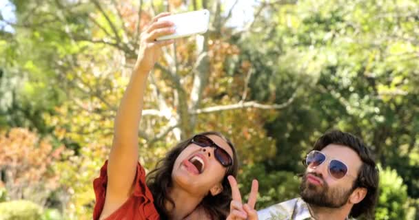 Hipster couple taking a selfie — Stock Video