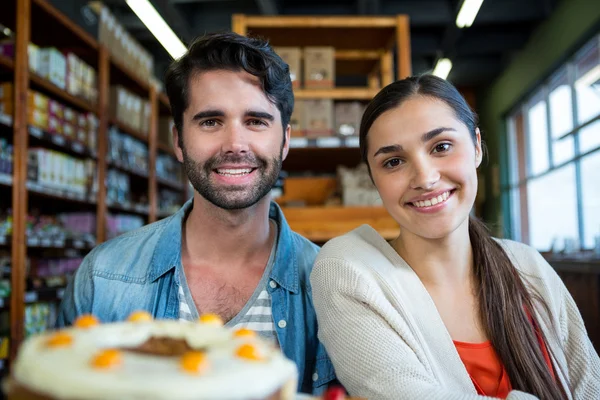 Couple at dessert counter — Stock Photo, Image