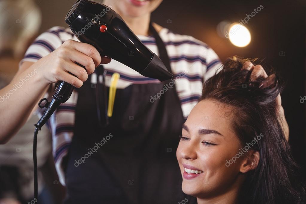 Pretty Woman Getting Her Hair Dried Stock Photo C Wavebreakmedia