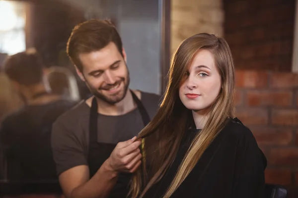 Handsome hair stylist with client — Stock Photo, Image