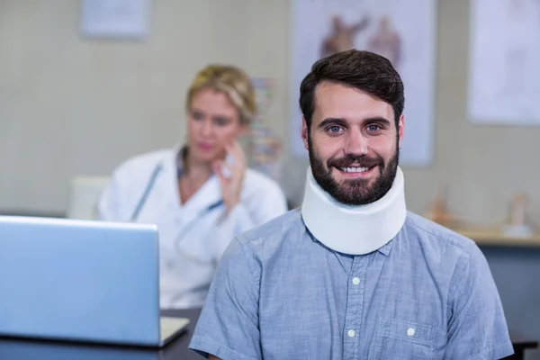 Patient with a cervical collar — Stock Photo, Image