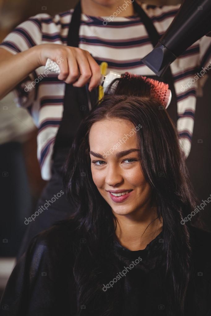Pretty Woman Getting Her Hair Dried Stock Photo C Wavebreakmedia