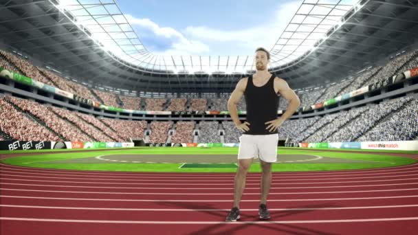 Seyirciler için el sallayarak erkek atlet — Stok video