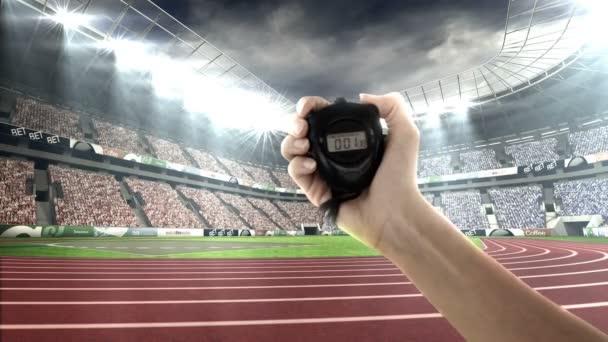 Hand met stopwatch in Olympisch Stadion — Stockvideo