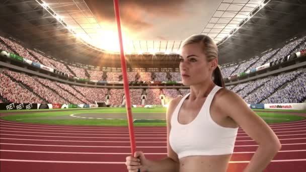 Female athlete standing with javelin throw — Stock Video