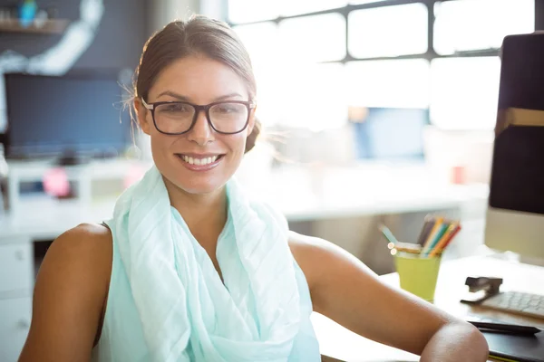 Business executive sitting in office — Stock Photo, Image