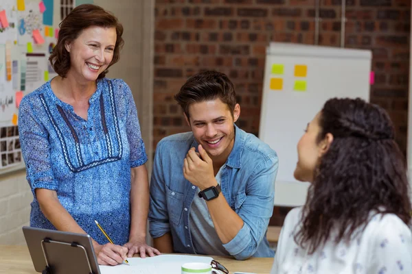 Business people interacting in office — Stock Photo, Image