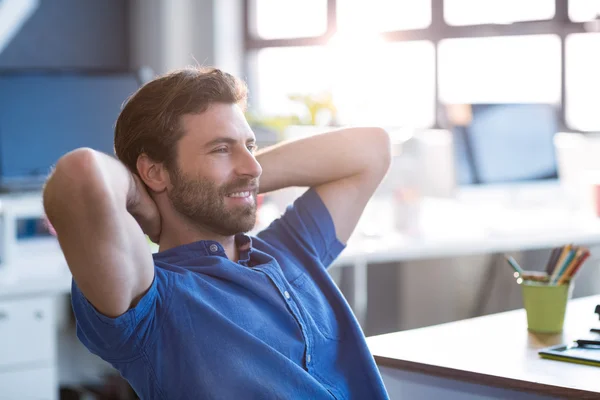 Graphic designer sitting in office — Stock Photo, Image