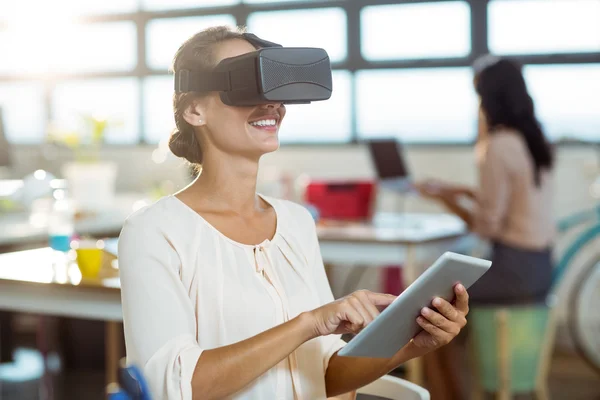 stock image graphic designer in virtual reality headset