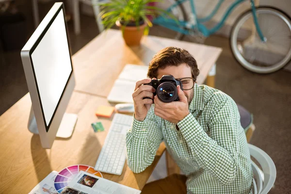 Graphic designer clicking photo — Stock Photo, Image