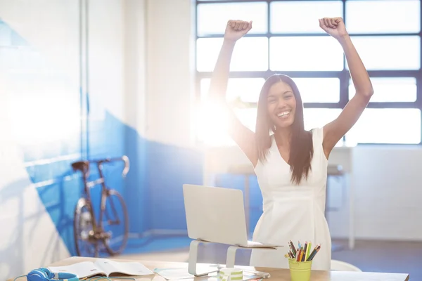 Business executive making fists in excitement — Stock Photo, Image