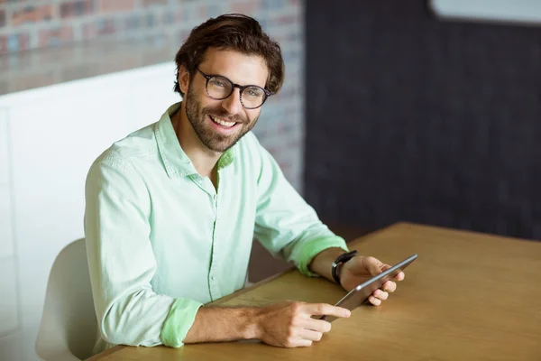 Male business executive holding digital tablet — Stock Photo, Image