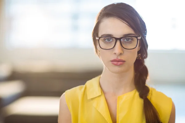 Portrait of female business executive standing — Stock Photo, Image