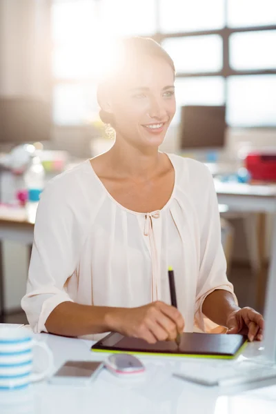 Businesswoman using graphic tablet — Stock Photo, Image