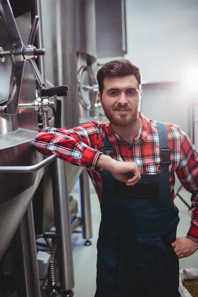 Male manufacturer standing in brewery — Stock Photo, Image