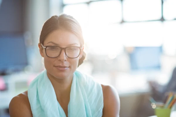 Business executive smiling in office — Stock Photo, Image