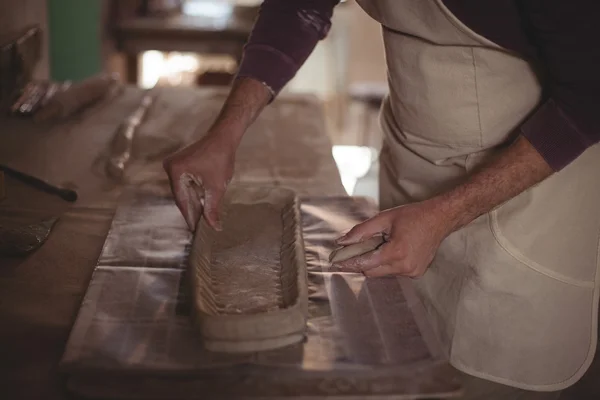 Male potter designing clay — Stock Photo, Image