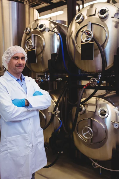 Confident manufacturer standing at brewery — Stock Photo, Image