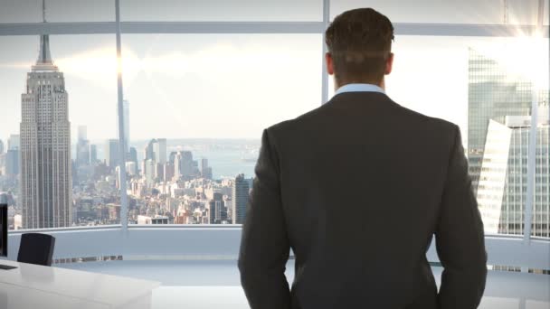 Businessman looking at office window — Stock Video