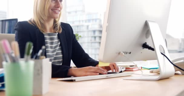 Businesswoman working over computer — Stock Video