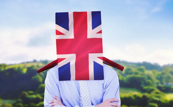 Empresario anónimo contra bandera nacional del Reino Unido — Foto de Stock