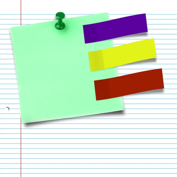 Sticky note with thumbtack against notepad — Stock Photo, Image