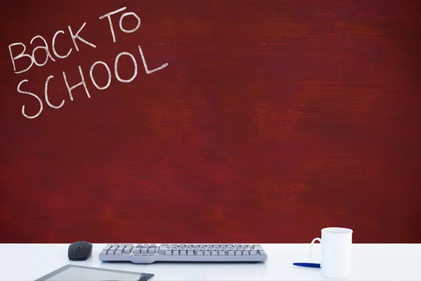Back to school message against blackboard — Stock Photo, Image