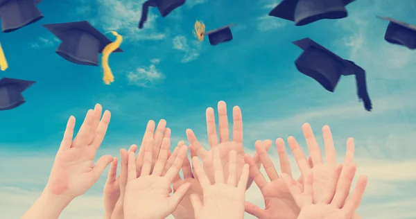 People raising hands in air — Stock Photo, Image