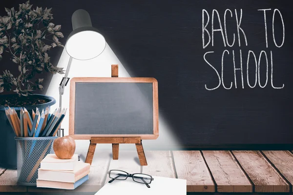 Back to school message against blackboard — Stock Photo, Image