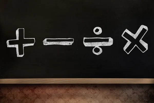 Drawing of cross against blackboard on wall — Stock Photo, Image