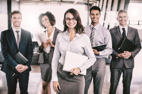 Equipo de negocios con documentos y organizador — Foto de Stock