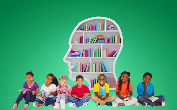 Elementary pupils reading books — Stock Photo, Image