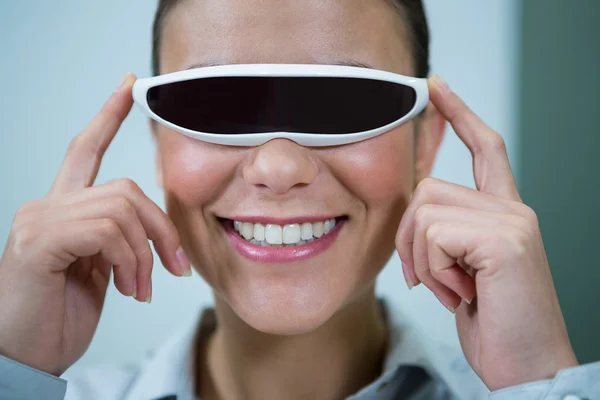 Woman using virtual video glasses — Stock Photo, Image