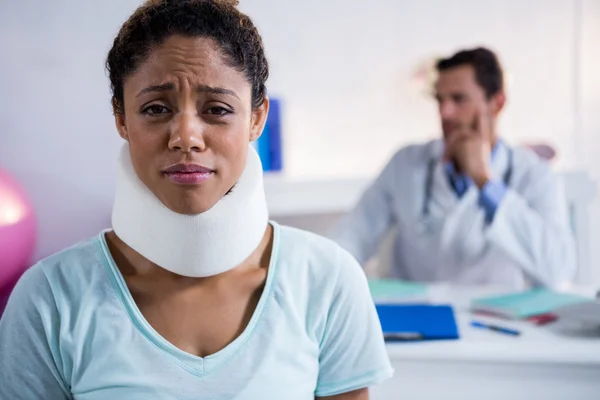 Patient with a cervical collar — Stock Photo, Image