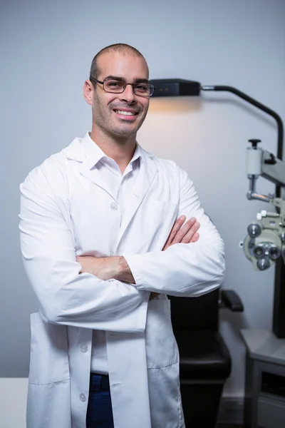 Portrait of male optometrist with arms crossed — Stock Photo, Image