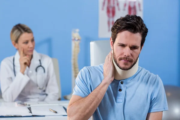 Patient with a cervical collar — Stock Photo, Image