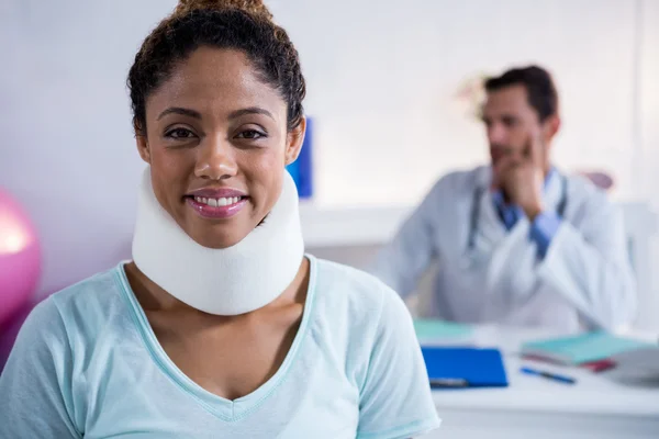 Patient with a cervical collar — Stock Photo, Image